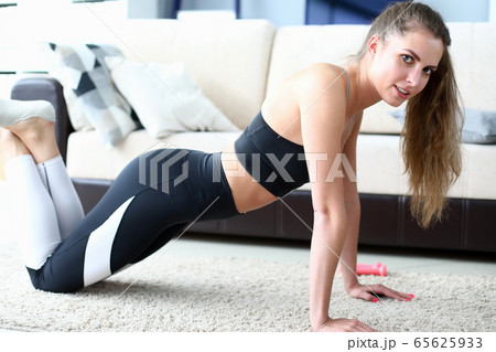 Pretty brunette girl indoors 65625933