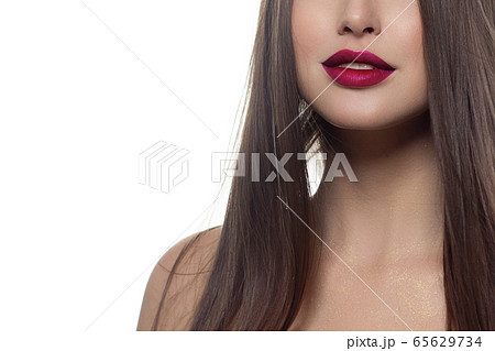 Beauty closeup of women full red lips with shiny Beauty closeup of women full red lips with shiny 65629734