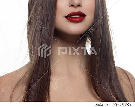 Cosmetics, makeup and trends. Bright lip gloss and Cosmetics, makeup and trends. Bright lip gloss and 65629735