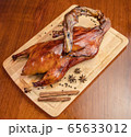 The grilled pecking duck on the table 65633012