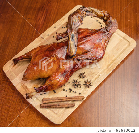 The grilled pecking duck on the table The grilled pecking duck on the table 65633012