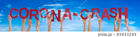 People Hands Holding Word Corona-Crash, Blue Sky People Hands Holding Word Corona-Crash, Blue Sky 65633293