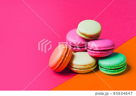 Cake macaron or macaroon on pink and orange Cake macaron or macaroon on pink and orange 65634647