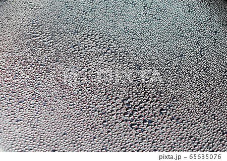 Water droplets were adhering to the metal surface from steam 65635076