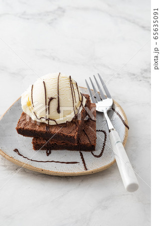 Chocolate Brownie with Ice Cream. Copy space. 65635091