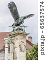 Sculpture of eagle with a sword 65637574