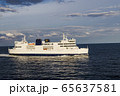 A ferry sailing through the strait 65637581