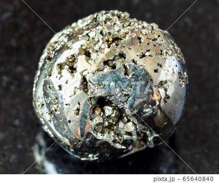 tumbled Pyrite ( fool's gold) rock on black tumbled Pyrite ( fool's gold) rock on black 65640840