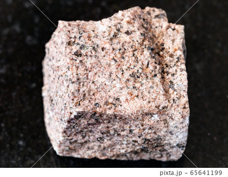 rough Aplite rock on black 65641199