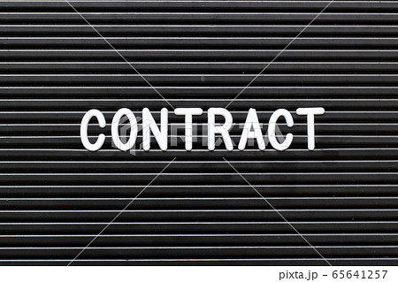 Black felt board with white alphabet in word contract background Black felt board with white alphabet in word contract background 65641257