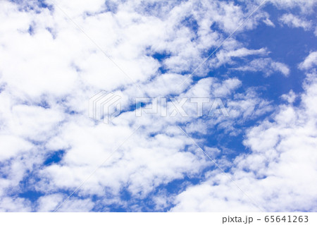 Clear blue color sky with white cloud background 65641263
