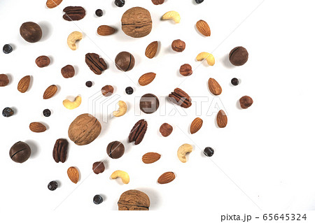 A pattern of nuts on a white background. 65645324