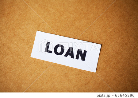 Credit concept. Loan written on white card. Credit concept. Loan written on white card. 65645596
