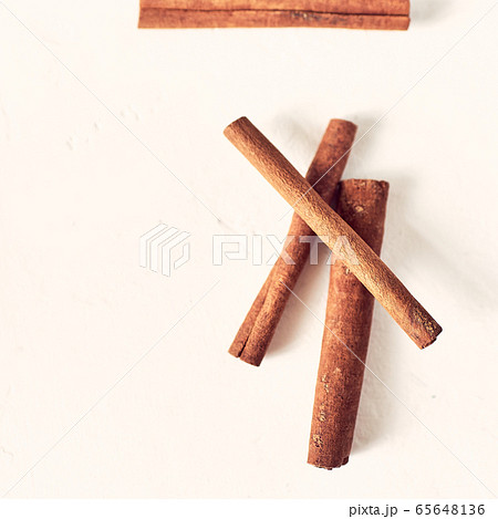 cinnamon sticks pattern on a white background, top view 65648136
