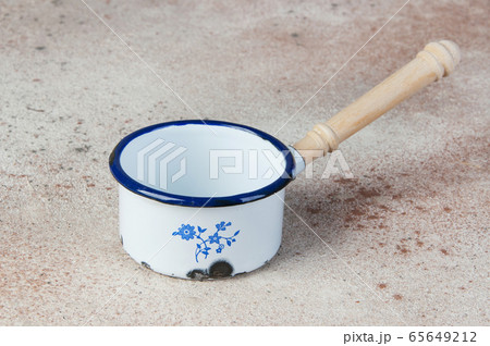 Antique metal ladle 65649212