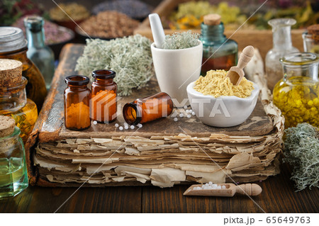 Bottles of homeopathic drugs, ingredients 65649763