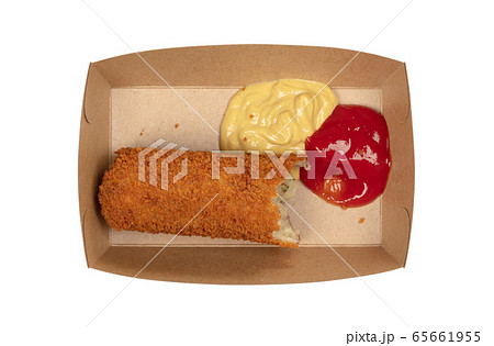 Partly eaten brown crusty dutch kroket with 65661955