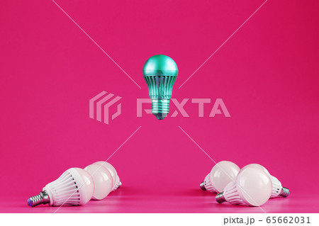 A special Light bulb hovers over simple, standard 65662031