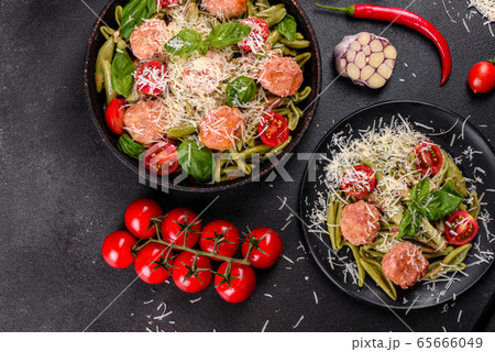 Delicious fresh pasta with meatballs 65666049