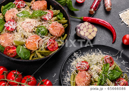 Delicious fresh pasta with meatballs 65666086