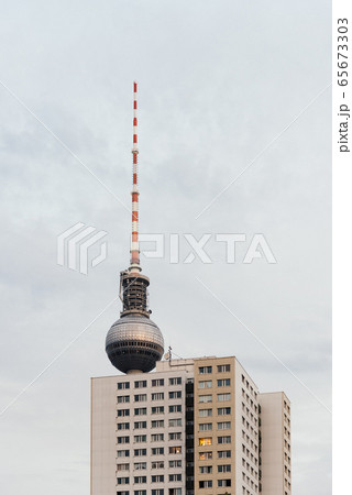 Television tower against blue sky with clouds in Berlin 65673303