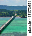 Landscape of tropical beach and long bridge  65673654