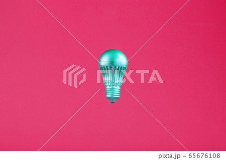 The light bulb hovers in the center of the frame 65676108