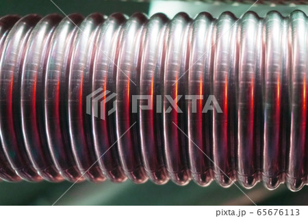 Corrugated metal hose for fuel supply, Close - up. Corrugated metal hose for fuel supply, Close - up. 65676113