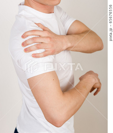 Crop of a man's body view on the side. Crop of a man's body view on the side. 65676556