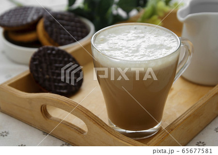 Latte coffee, glass cup of coffee and milk with Latte coffee, glass cup of coffee and milk with 65677581