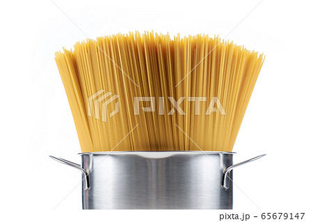 pasta spaghetti in a saucepan on a white background pasta spaghetti in a saucepan on a white background 65679147