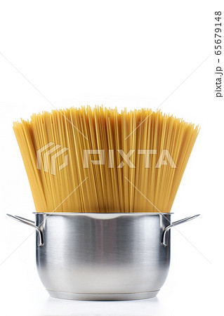 pasta spaghetti in a saucepan on a white background pasta spaghetti in a saucepan on a white background 65679148