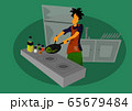 a guy stir fry the vegetables in the kitchen 65679484