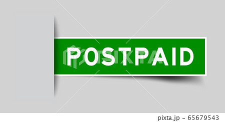 Inserted green color sticker label with word postpaid on gray background 65679543