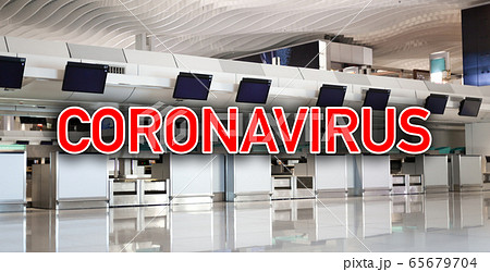 Sign coronavirus over airport terminal with nobody 65679704