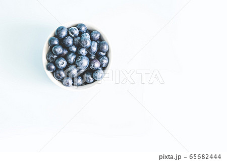 Fresh raw organic blueberry in mug with copy space 65682444