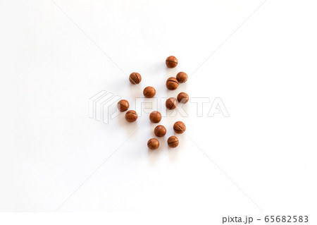 Top view of Macadamia nuts and space for text on Top view of Macadamia nuts and space for text on 65682583