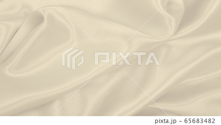 Smooth elegant golden silk or satin luxury cloth Smooth elegant golden silk or satin luxury cloth 65683482