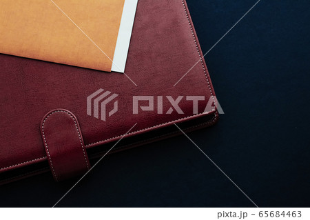 Office desk with briefcase and business card, finance and economy Office desk with briefcase and business card, finance and economy 65684463