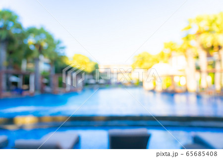 Abstract blur and defocus outdoor swimming pool in hotel resort for background 65685408
