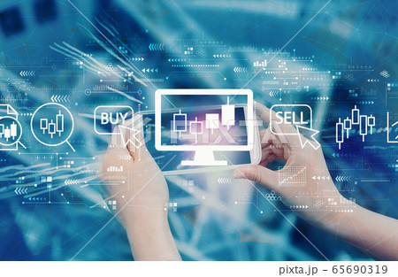 Stock trading theme with person using smartphone 65690319