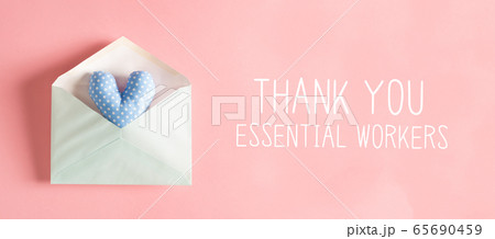 Thank You Essential Workers message with a heart cushion in an envelope Thank You Essential Workers message with a heart cushion in an envelope 65690459