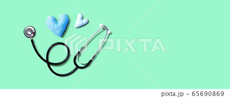 Medical worker appreciation theme with hearts and stethoscope Medical worker appreciation theme with hearts and stethoscope 65690869