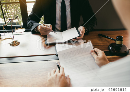 Business lawyer is currently counseling the Business lawyer is currently counseling the 65691615