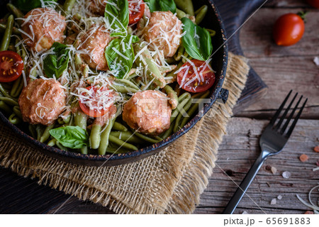 Delicious fresh pasta with meatballs 65691883