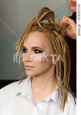 Process of creating stylish look 65693536