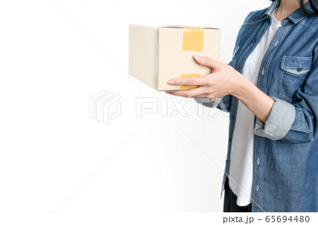Delivery hand holding cardboard boxes.  Business 65694480