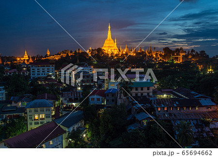 Night view of Shwedagon pagoda an iconic landmark of Yangon township of Myanmar. Night view of Shwedagon pagoda an iconic landmark of Yangon township of Myanmar. 65694662