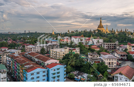 Scenery view of Shwedagon pagoda an iconic landmark of Yangon township of Myanmar. Scenery view of Shwedagon pagoda an iconic landmark of Yangon township of Myanmar. 65694671