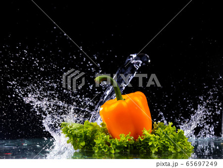 fresh water splash on red sweet pepper fresh water splash on red sweet pepper 65697249